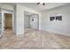 Bright bedroom with neutral tile flooring and a mirrored closet at 23 Golfview Rd, Rotonda West, FL 33947