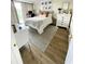 Light-filled bedroom featuring a comfortable bed, a desk, and neutral decor at 3211 W Swann Ave # 408, Tampa, FL 33609