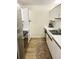 Efficient kitchen with modern appliances, sleek cabinetry, and a streamlined design for easy meal preparation at 3211 W Swann Ave # 408, Tampa, FL 33609