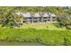Waterfront property with an expansive lawn and patio space for outdoor entertainment at 1111 N Bayshore Blvd # D6, Clearwater, FL 33759