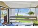 Enjoy relaxing views from the bright and breezy screened-in balcony at 1111 N Bayshore Blvd # D6, Clearwater, FL 33759