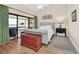 Primary bedroom showcasing water views through sliding glass doors and neutral decor at 1111 N Bayshore Blvd # D6, Clearwater, FL 33759