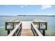 Wooden dock with benches offering stunning views of the water and nearby island at 1111 N Bayshore Blvd # D6, Clearwater, FL 33759