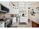 Bright kitchen featuring white cabinets, stainless steel appliances, and an open layout at 1111 N Bayshore Blvd # D6, Clearwater, FL 33759
