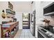 Cozy kitchen area with counter space and stainless steel refrigerator, creating a functional cooking space at 1111 N Bayshore Blvd # D6, Clearwater, FL 33759