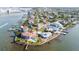 Waterfront property with boat docks nestled in a coastal community at 520 Baywood S Dr, Dunedin, FL 34698