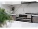 Close-up of stainless steel oven and marble backsplash at 520 Baywood S Dr, Dunedin, FL 34698