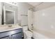 Updated bathroom with a shower-tub combo, neutral paint, and modern vanity at 13516 Copper Head Dr, Riverview, FL 33569