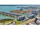 A beautiful view of waterfront condos and a marina, showcasing a vibrant coastal community with access to the open sea at 1581 Gulf Blvd # 102N, Clearwater Beach, FL 33767