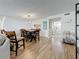 Spacious dining area with views of the kitchen and front entry at 1581 Gulf Blvd # 102N, Clearwater Beach, FL 33767