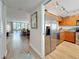 The updated kitchen and adjacent living room offer a seamless transition for modern living and entertaining at 1581 Gulf Blvd # 102N, Clearwater Beach, FL 33767
