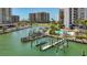 Waterfront condos with private docks, boat lifts, and a community pool, offering a luxurious coastal living experience at 1581 Gulf Blvd # 102N, Clearwater Beach, FL 33767