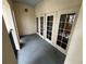 Relaxing balcony space with French doors, gray flooring, and a peaceful ambiance at 200 4Th S Ave # 231, St Petersburg, FL 33701