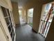 Open-air balcony with black railings and a view of the surrounding neighborhood and trees at 200 4Th S Ave # 231, St Petersburg, FL 33701