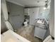 Bathroom featuring a tub and shower, white fixtures, and granite counters at 200 4Th S Ave # 231, St Petersburg, FL 33701