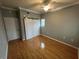 Bedroom with a ceiling fan and sliding closet door at 200 4Th S Ave # 231, St Petersburg, FL 33701