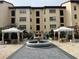 Beautiful courtyard featuring a tiled fountain and lounge areas under white canopies at 200 4Th S Ave # 231, St Petersburg, FL 33701