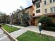 Condominium complex showcasing an iron gate entrance surrounded by lush tropical landscaping at 200 4Th S Ave # 231, St Petersburg, FL 33701