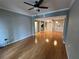 Bright living room with wood floors, ceiling fan and easy access to kitchen at 200 4Th S Ave # 231, St Petersburg, FL 33701