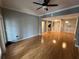 Bright living room with wood floors, ceiling fan and easy access to kitchen at 200 4Th S Ave # 231, St Petersburg, FL 33701