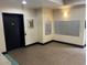 Condo Lobby with black door, mailboxes, and neutral colored flooring at 200 4Th S Ave # 231, St Petersburg, FL 33701