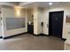 Condo lobby area with mailboxes, elevator, and community information bulletin board at 200 4Th S Ave # 231, St Petersburg, FL 33701