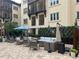 Outdoor patio lounge with comfortable seating, umbrellas, and modern decor at 200 4Th S Ave # 231, St Petersburg, FL 33701