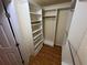 Spacious walk-in closet with installed shelving for organized storage at 200 4Th S Ave # 231, St Petersburg, FL 33701