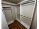 Spacious walk-in closet with installed shelving and rod for organized storage at 200 4Th S Ave # 231, St Petersburg, FL 33701