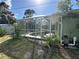 Outdoor swimming pool with screen enclosure at 21285 Peachland Blvd, Port Charlotte, FL 33954