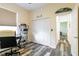 This bedroom offers great closet space, a neutral color palette and modern flooring at 1647 Stable Trl, Palm Harbor, FL 34685