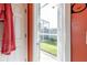 Door leading to a screened patio and backyard, offering easy outdoor access at 1647 Stable Trl, Palm Harbor, FL 34685