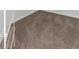Neutral carpet flooring in a closet at 7327 Brightwaters Ct, New Port Richey, FL 34652