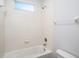 Full bathroom with a shower-tub combo and a neutral color scheme at 12402 Creek Edge Dr, Riverview, FL 33579