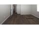 Bedroom includes a ceiling fan, window and view to hallway at 1610 Spinning Wheel Dr, Lutz, FL 33559