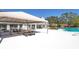 Community pool offers picnic tables and covered seating at 1610 Spinning Wheel Dr, Lutz, FL 33559