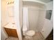 Bathroom with shower/tub combo, single sink vanity, tiled floors at 8006 Beaver Creek Loop, Hudson, FL 34667