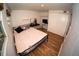 Bedroom with a large bed and closet at 8006 Beaver Creek Loop, Hudson, FL 34667