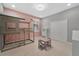 Comfortable bedroom with a unique bunk bed, a closet with double doors, and space for a study area at 32554 Silvercreek Way, Wesley Chapel, FL 33545