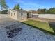 View of the backyard, with carport and partial fence at 701 71St N Ave, St Petersburg, FL 33702