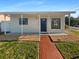 Charming single-story home with a well-maintained lawn and inviting front porch at 701 71St N Ave, St Petersburg, FL 33702