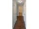 Hallway features tile floors and access to the bathroom, creating a clean and accessible space at 701 71St N Ave, St Petersburg, FL 33702