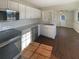 Bright kitchen featuring stainless appliances, updated cabinets and flooring at 701 71St N Ave, St Petersburg, FL 33702