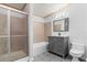 Bathroom featuring a shower over tub, granite vanity, and modern fixtures at 10809 Cedar Cove Drive, Thonotosassa, FL 33592