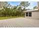 Open deck providing a great view of surrounding trees and yard at 10809 Cedar Cove Drive, Thonotosassa, FL 33592