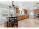 Well-equipped kitchen with granite countertops, wood cabinets, and stainless steel appliances at 10809 Cedar Cove Drive, Thonotosassa, FL 33592