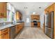 Modern kitchen features stainless steel appliances, granite countertops, and lots of storage at 10809 Cedar Cove Drive, Thonotosassa, FL 33592