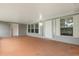 Covered patio area with a door to the outside at 10809 Cedar Cove Drive, Thonotosassa, FL 33592