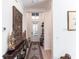 Inviting entry hallway with high ceilings, neutral walls, and decorative accents at 25301 Longmeadow Dr, Punta Gorda, FL 33955