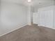 Bedroom showing two closets and tile flooring at 4914 Trinidad Dr, Land O Lakes, FL 34639